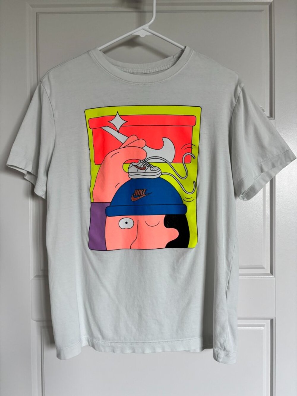 Nike The Nike Tee Graphic T-Shirt Womens White Cartoon Print